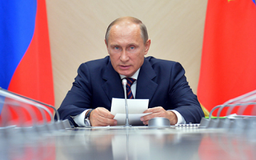 متطوعون روس يدشنون حملة توقيعات لدعم بوتين فى انتخابات الرئاسة المقبلة