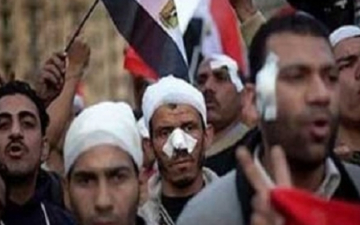 مصابو الثورة يتظاهرون بـ”عبد المنعم رياض” للمطالبة بحد أدني للأجور ‎