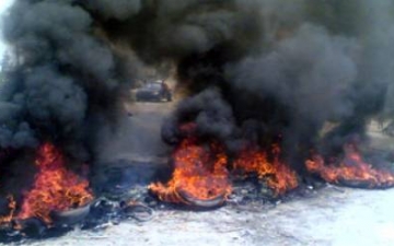 اشتباكات بين الأهالى وأنصار مرسى بالسويس.. والأمن يطلق الغاز