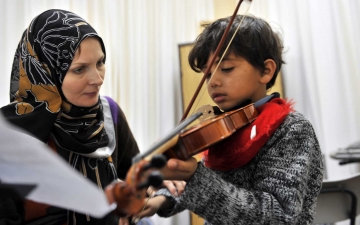صالون موسيقي لتعليم أطفال الفقراء مجانا بالأردن