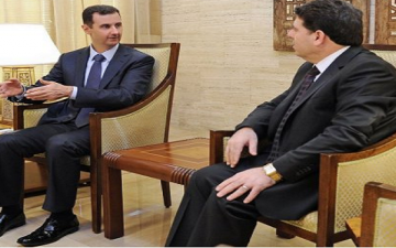 «الأسد» يعين «الحلقي» رئيسا للحكومة السورية الجديدة