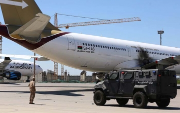 ليبيا تنتظر الهدوء والاستقرار بعد سيطرة ثوار “فجر ليبيا” على مطار طرابلس
