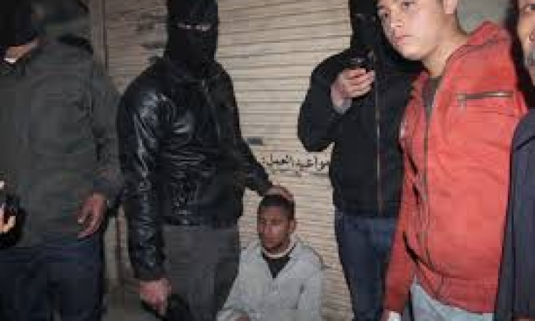 القبض علي 14 طالب بتهمة حرق سيارات لضباط الشرطة بالدقهلية