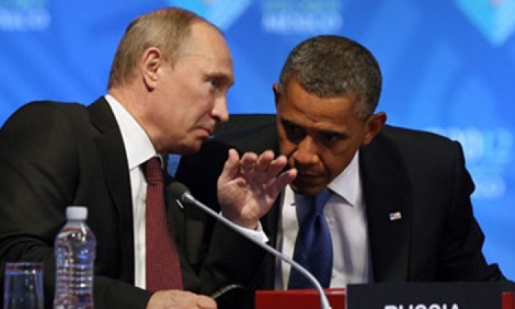 أوباما يبرر العقوبات على روسيا.. وبوتين: العلاقات يجب ألا تتأثر بأوكرانيا
