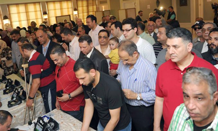 العليا للانتخابات: الإقبال الشديد وراء بطء أجهزة القارئ الإلكتروني وتأخر التصويت في سفارة مصر بالكويت