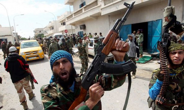 انسحاب المجموعات المسلحة من أمام مديرية الأمن ببنغازي