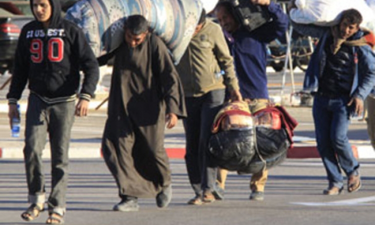 دراسة للأمم المتحدة تتوقع عودة 250 ألف مصري من العاملين في ليبيا