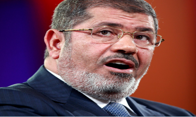 الحكم بالمؤبد لمرسى فى قضية التخابر مع قطر