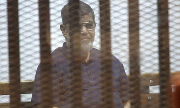 بالصور ..  محاكمة مرسى فى قضية التخابر مع قطر