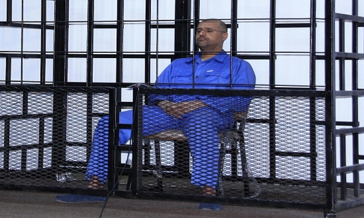 محامى نجل القذافى: محاكمة موكلى بالإعدام غيابيًا صورية وغير قانونية