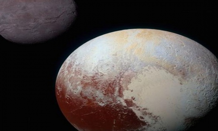 ناسا تظهر لأول مره صور ملونة  لكارون قمر بلوتو