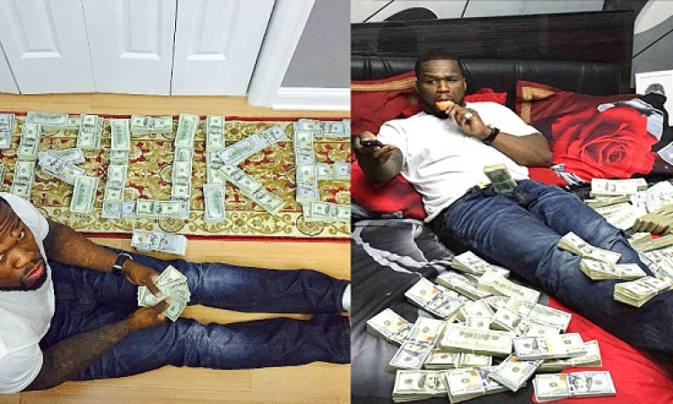 صور 50 Cent وهو يسبح بين الدولارات تقوده للمحكمة ؟!