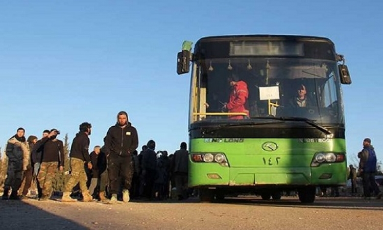 خروج الدفعة الرابعة للمسلحين من حى الوعر بحمص