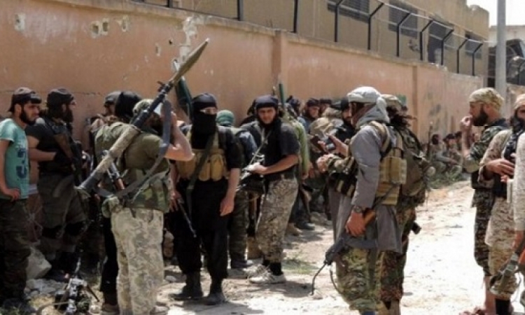 جيش الإسلام يبدأ بتسليم أسلحته الثقيلة والمتوسطة في الضمير شمال سوريا