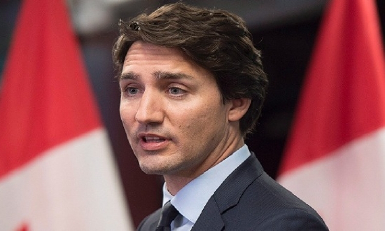 هل يطيح الساعدى القذافى رئيس وزراء كندا ؟